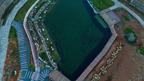 A small pool in the middle of a mountain Stock-Footage 273012391