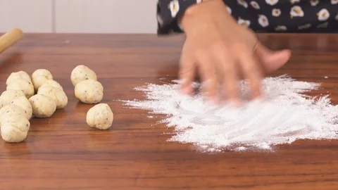Small Poori Rolling out using a Rolling Pin - Closeup Shot 動画素材 82836865
