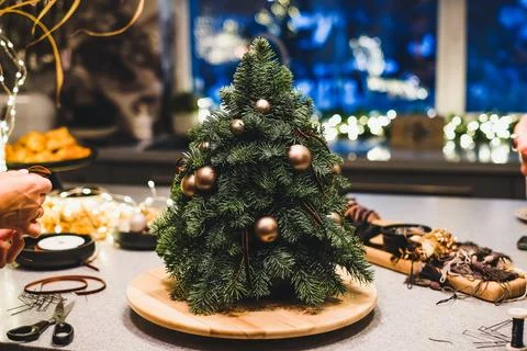 Small portable tabletop easy DIY decorated Christmass tree. Defocused Stock Photos