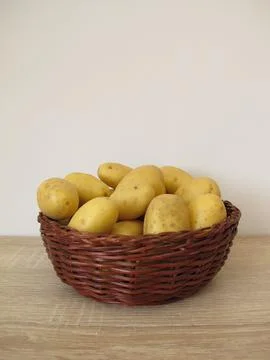 Small potatoes in a basket Photos