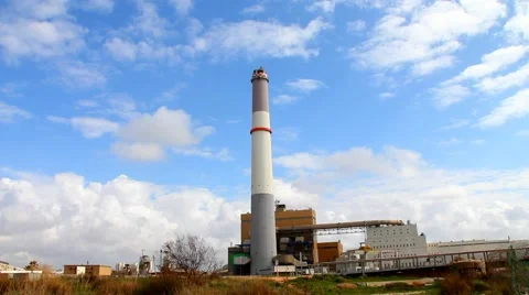 Small power plant using gas on blue cloudy  sky background 動画素材 47734986