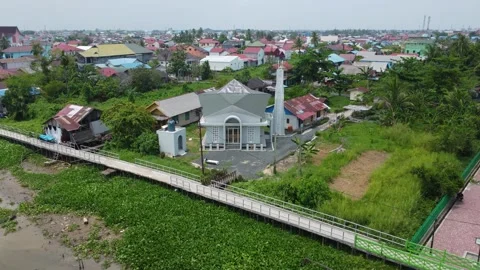 A small prayer room with a unique building shape is located near the Banua .. Stock Footage 256119129