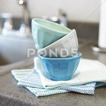 Small Prep Bowls Stacked On Kitchen Towels On A Kitchen Counter