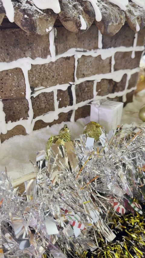 Small present box christmas decoration metallic garlands bricks vertical Video stock 322935639