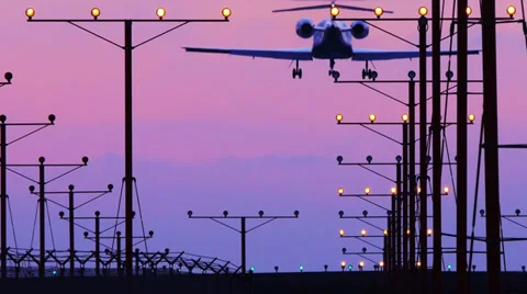 Small private business airplane jet plane landing  airport sunset. Slow motion. Stock Footage 38895570