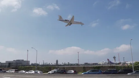 Small private jet lands on runway Stock Footage 89186438