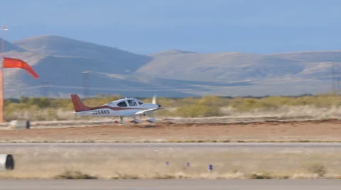 Small Private Plane Heads Down Runway for Take-off Stock Footage 60847546