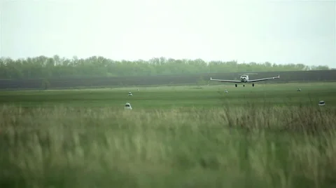 Small private planes on green field Stock Footage 65286745