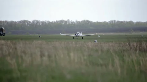 Small private planes on green field Stock Footage 65286753