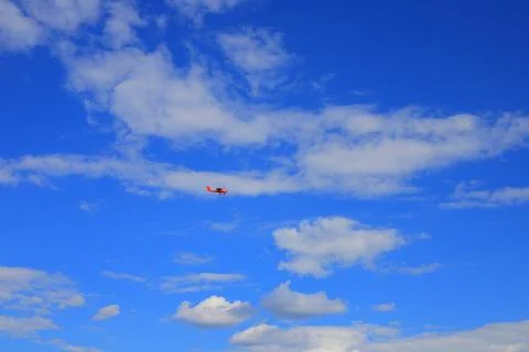 Small private propeller plane flies in the sky Stock Photos