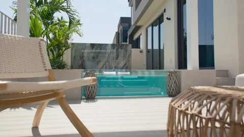 A small private swimming pool in the backyard of a luxury villa in Dubai on a Stock Footage 308284931
