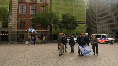 Small Pro Israel protest as an answer to Pro Palestine protest in Amsterdam. Stock Footage 253305424