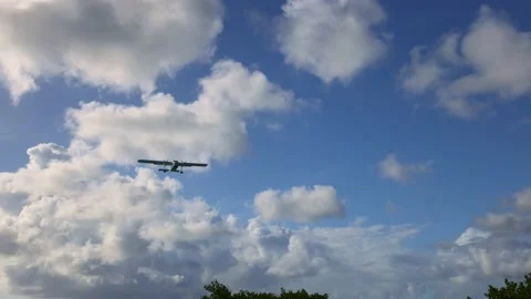 Small propaleplane in the sky, view from the land. Stock-Footage 172189592