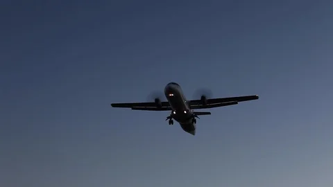 Small propeller plane flying to land in airport Stock Footage 120542502