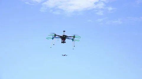 Small Quadcopter Drones Flying Around The City 4K Stock-Footage 45603007