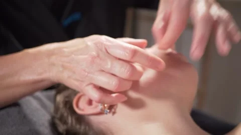 Small quick peaks on the cheek Stock Footage 225038573