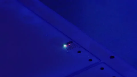 Small red and green leds blinking on a blue circuit board Stock Footage 316540541