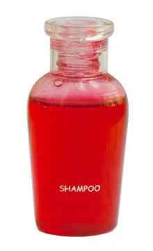 Small red bottle of shampoo Stock Photos