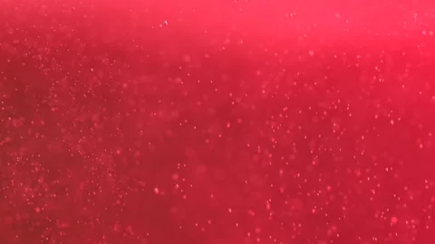 Small red bubbles rise in the water Stock Footage 276322986