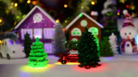 A small red car with a Christmas tree on the roof moves Stock Footage 295479455