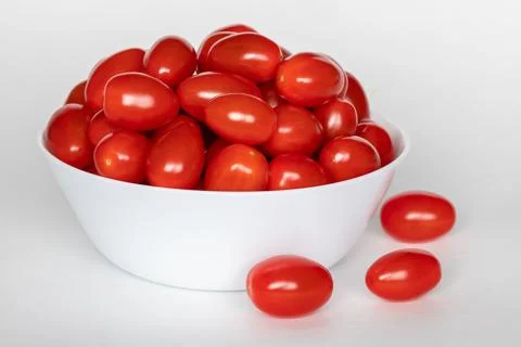 Small red cherry tomatoes isolated on white background 스톡 사진