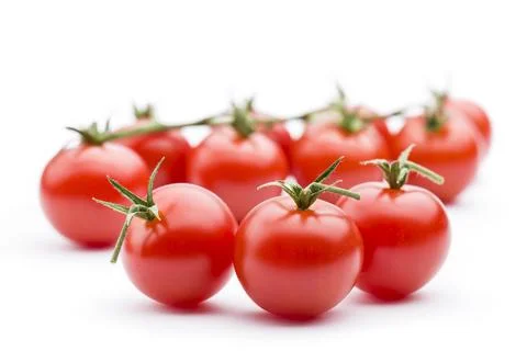 Small red cherry tomatoes. Stock Photos