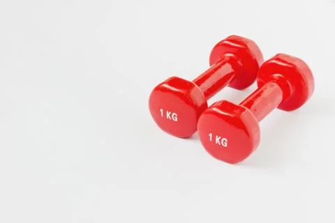 Small red dumbbell Stock Photos