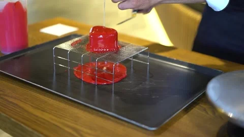 Small red heart shaped cake Stock Footage 167588024