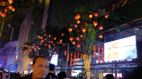 Small red lanterns hanging in the streets of Chongqing during Spring Festival Stock Footage 146667509