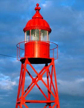 Small red lighthouse Stock Photos