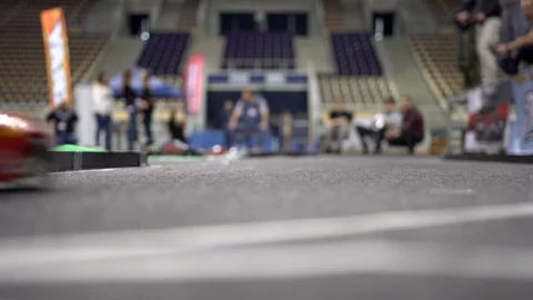 Small red RC car on the track drifting i... | Stock Video | Pond5