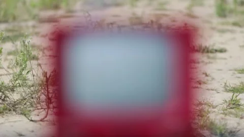Small red soviet tv at the shooting range Stock Footage 195095599