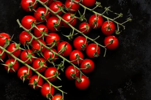 Small red tomatoes Stock Photos