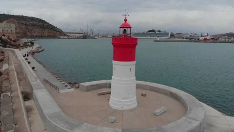 A small red white lighthouse on the pier in Cartagena. Stock Footage 135300275