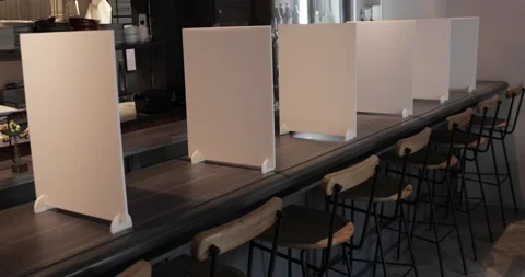 Small restaurant implementing infection prevention measures and social Stock Footage 138341006