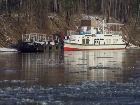 Small retro ship in the river and Floes passing by Stock Footage 72950965