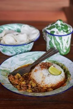 Small rice portion with beef gulai Stock Photos