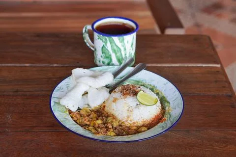 Small rice portion with beef gulai Stock Photos