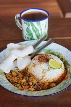 Small rice portion with beef gulai Stock Photos