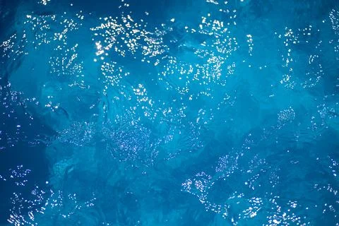 A small ripple on the surface of clear blue sea water, a natural background w 写真素材