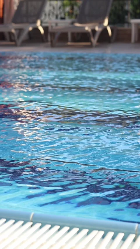 Small ripples on the surface of the water in the pool. Swimming pool Stock Footage 315461564