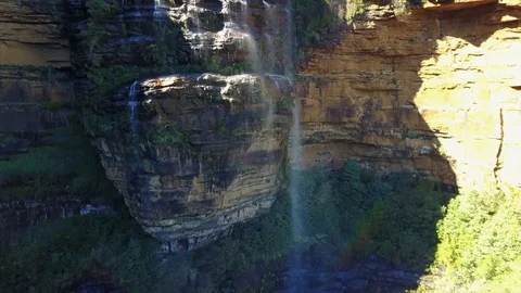 Small river and waterfall in the mountains of the overgrown forest. Stock Footage 95897766