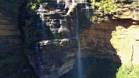 Small river and waterfall in the mountains of the overgrown forest. Video stock 95897775