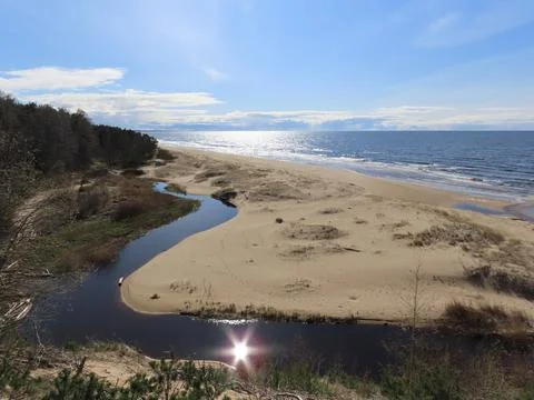 Small river on beach Stock Photos