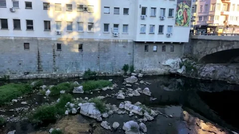 A Small River In The City Center. River And Small Rocks. Beautiful River. Stock Footage 149651964