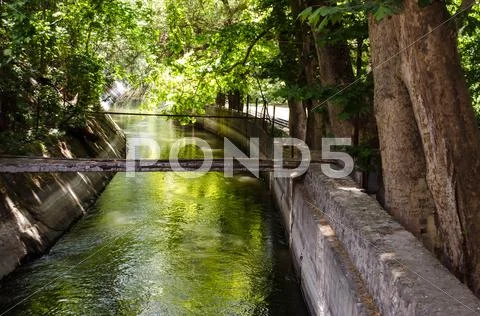 Small river in the city park Stock Photos