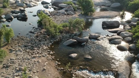 Small river - drone shot close-up Stock Footage 107880548