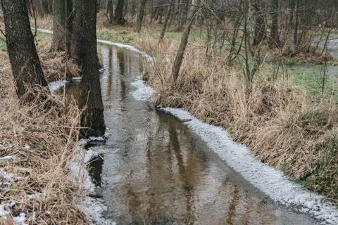Small river at the end of winter Stock Photos