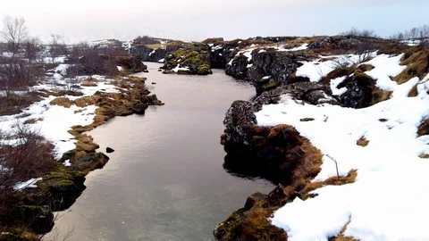 Small river in a field in Iceland Stock Footage 106192387