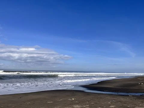 Small River Flowing Into the Ocean on Tropical Beach Stock Photos